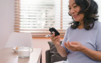 senior-womans-hand-checking-her-blood-sugar-level-with-glucometer-by-herself-her-home_EXT